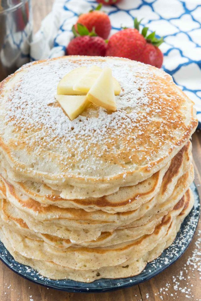 Apple Fritter Pancakes are FULL of grated apples and they're the perfect fall breakfast. Made with PROTEIN pancake mix, they fill you up too!