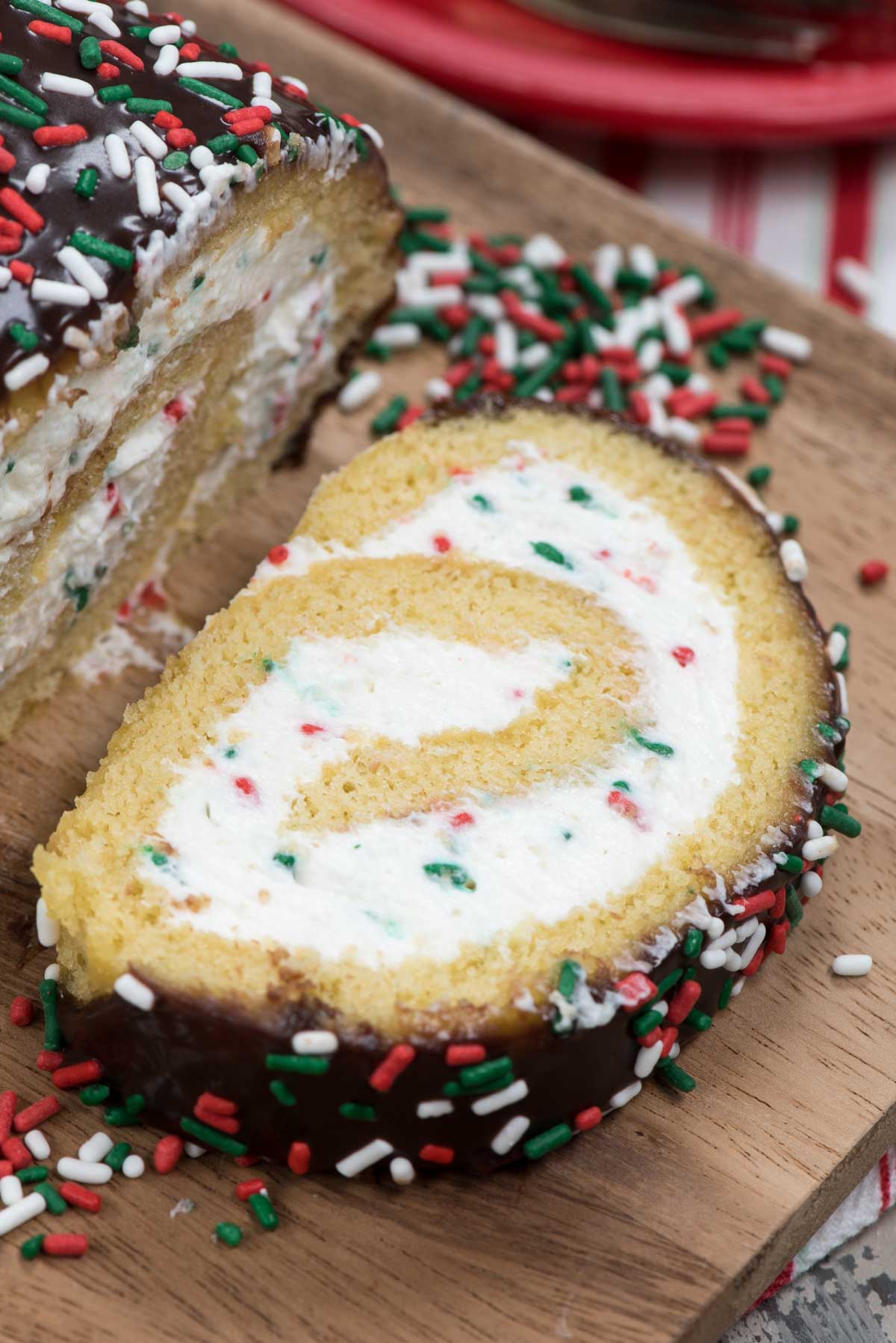 Christmas Cake Roll Recipe, vanilla cake with whipped cream filling and chocolate ganache