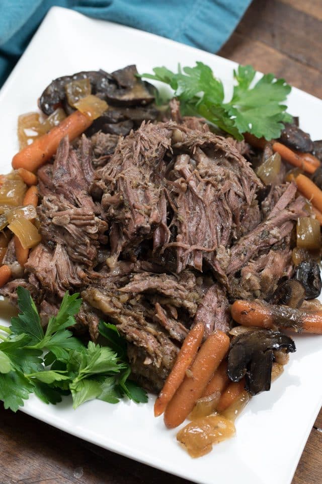 crockpot pot roast on white plate