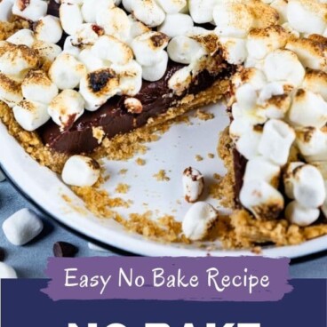 S'mores pie in pie dish with one slice missing and colorblock with recipe title on bottom of image