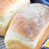 Two loaves of easy white bread on cooling rack