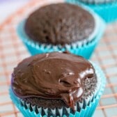 Close up shot of three chocolate cupcakes