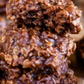 Stack of classic no bake cookies with top cookie split in half