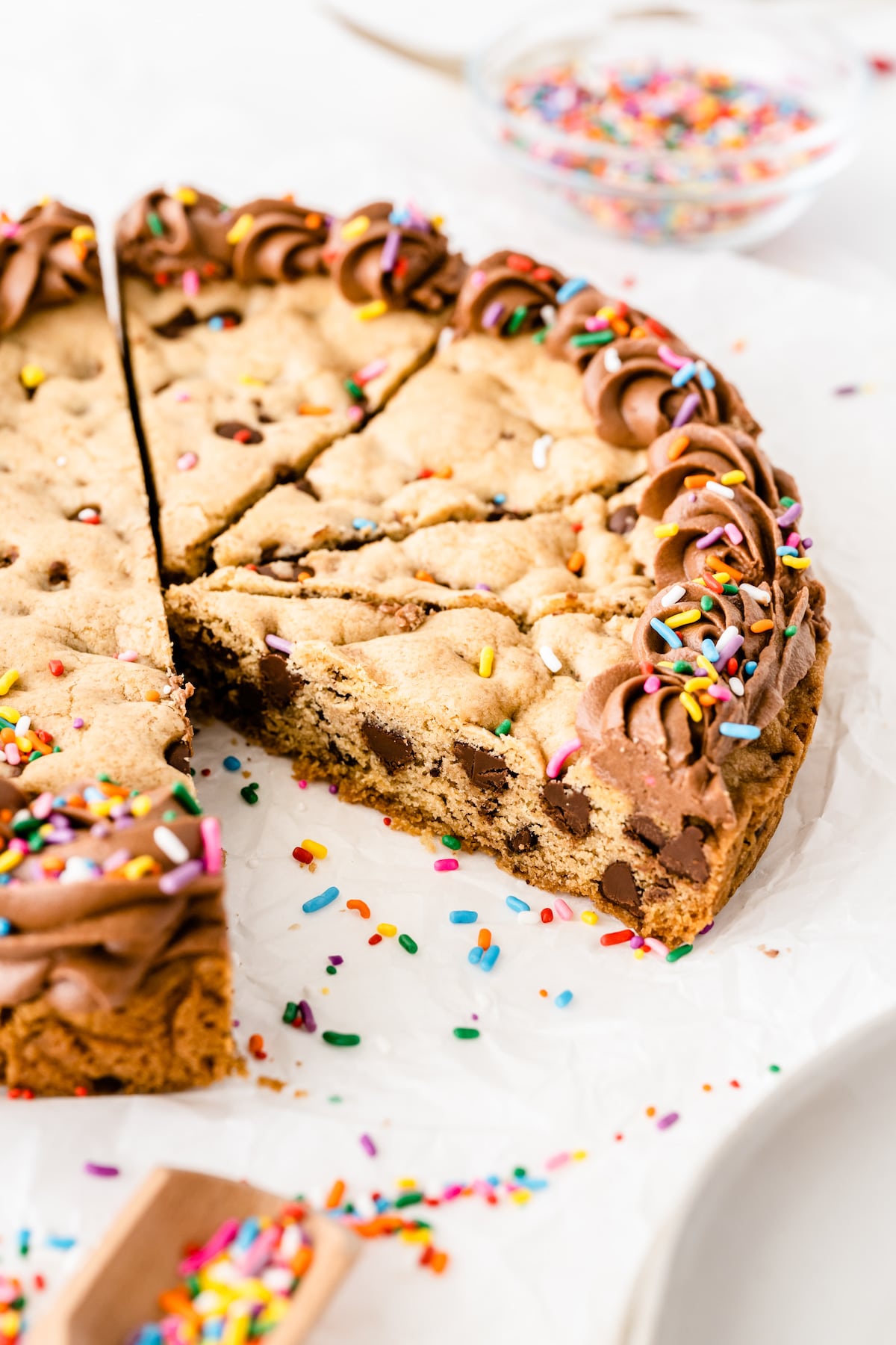 Cookie cake cut into slices with one slice missing