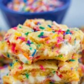 Stack of funfetti gooey bars with sprinkles