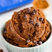 Bowl full of double chocolate chip edible cookie dough with chocolate chips on top