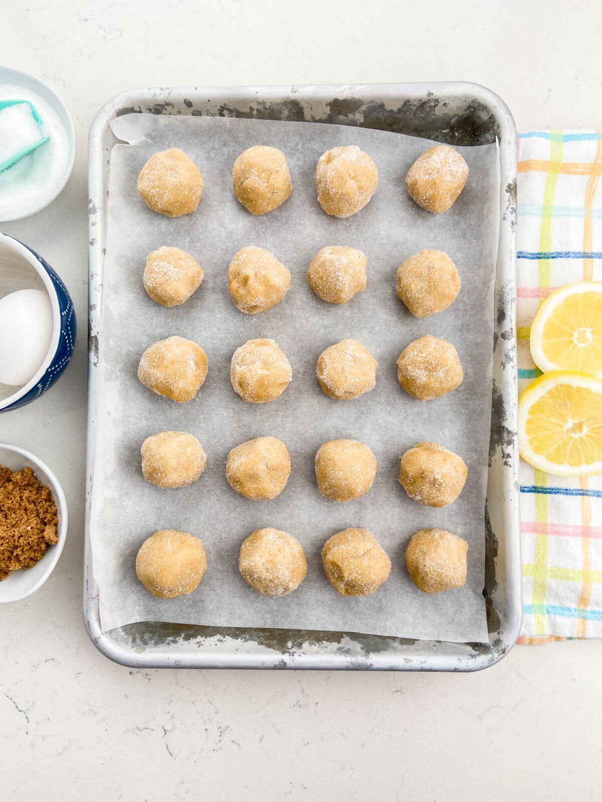 cookie balls on cookie sheet.
