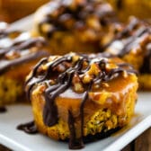 Close up shot of mini turtle pumpkin cheesecakes