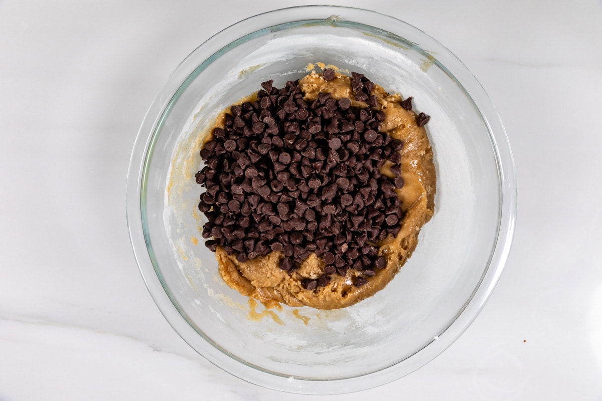 clear bowl with cookie dough and chocolate chips
