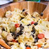 chicken pasta salad in bowl with napkin behind