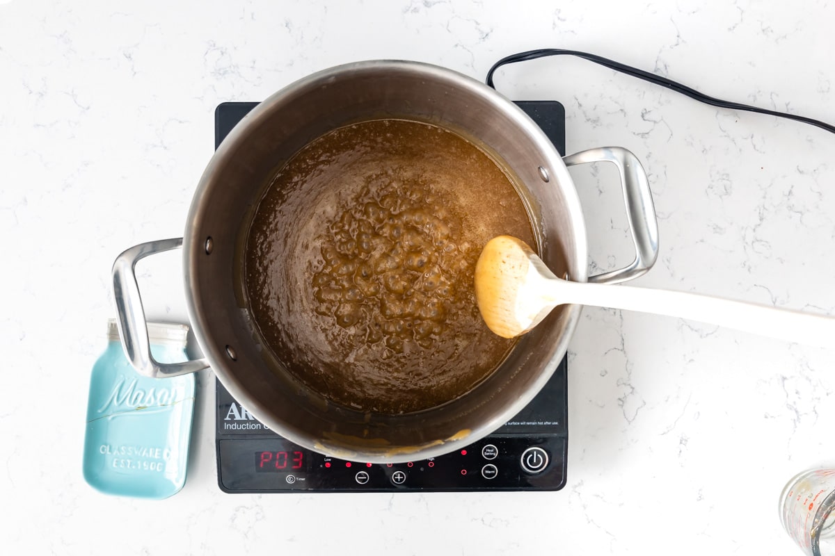 pot on hot plate with boiling brown sugar.