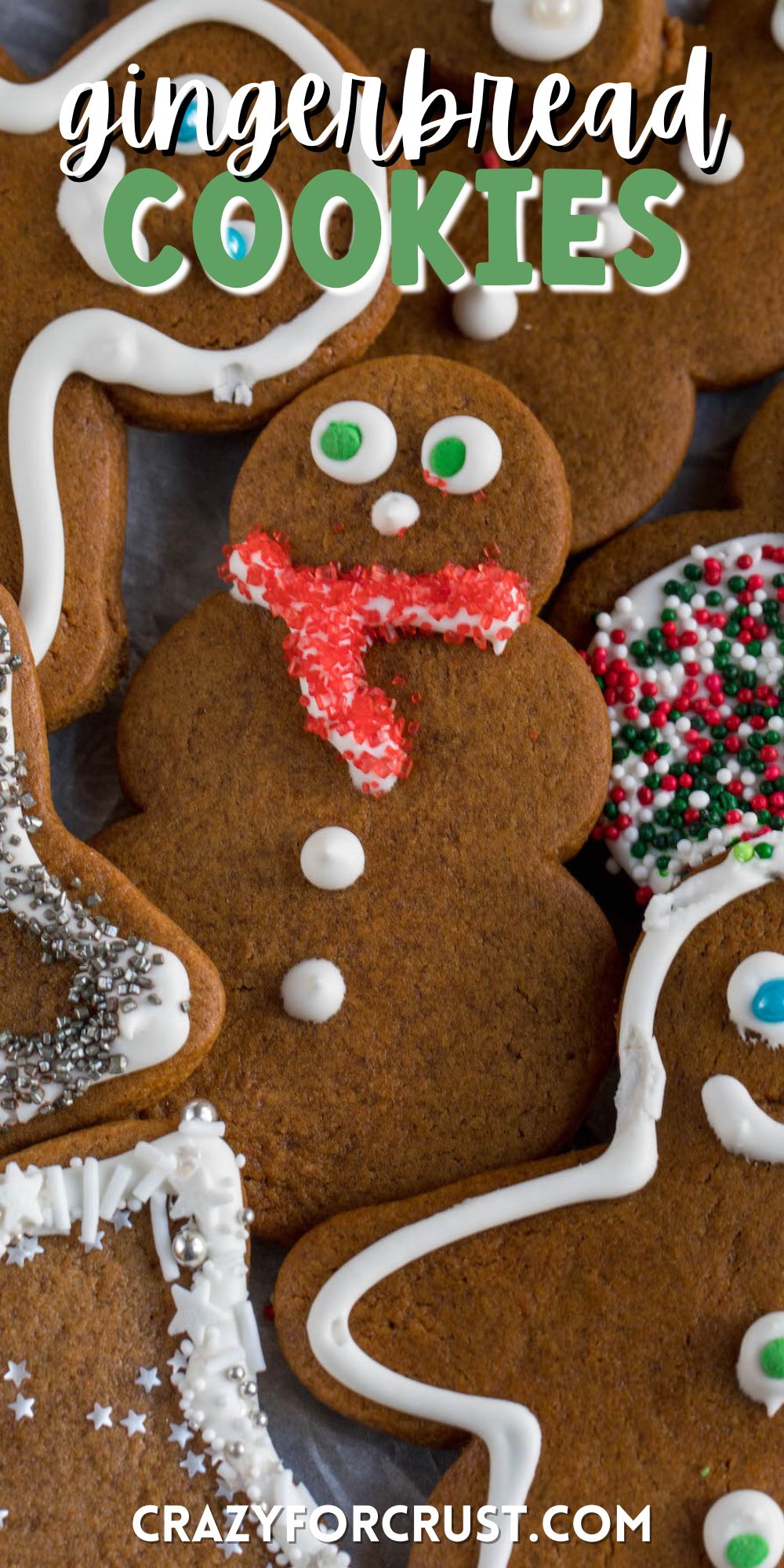 cutout gingerbread cookies with white icing and words on the image