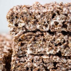 stacked Rice Krispie Treats made with cocoa pebbles.