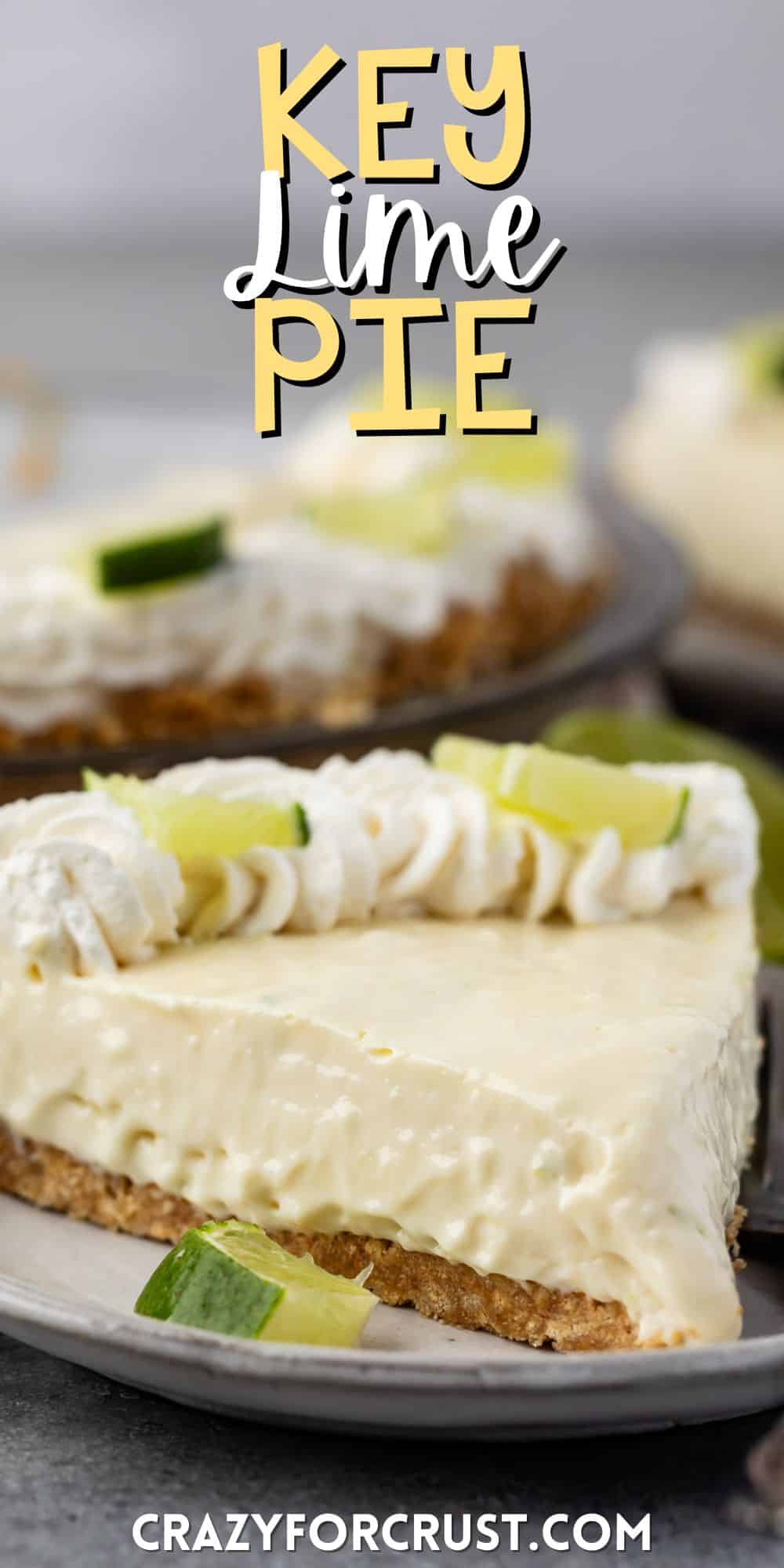 slice of key lime pie with whipped cream and sliced lime on top with words on the image.
