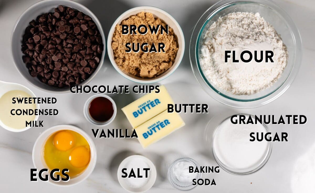 ingredients in cookie bars laid out on a white counter.