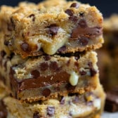 stacked gooey bars with chocolate chips baked into the center.