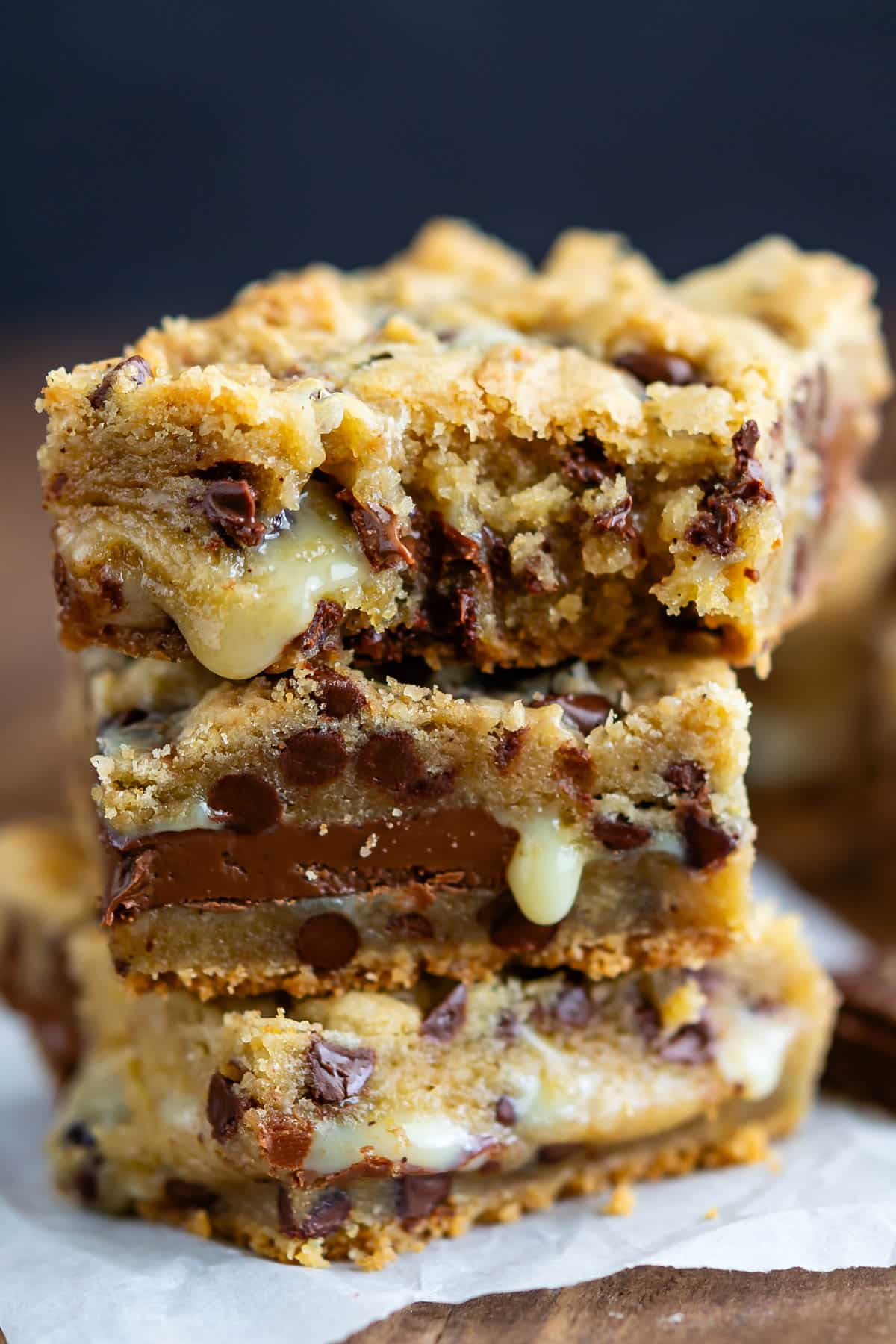 stacked gooey bars with chocolate chips baked into the center.