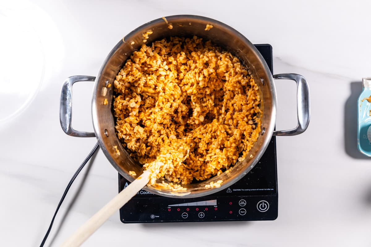 process shot of making peanut butter Rice Krispie treats.