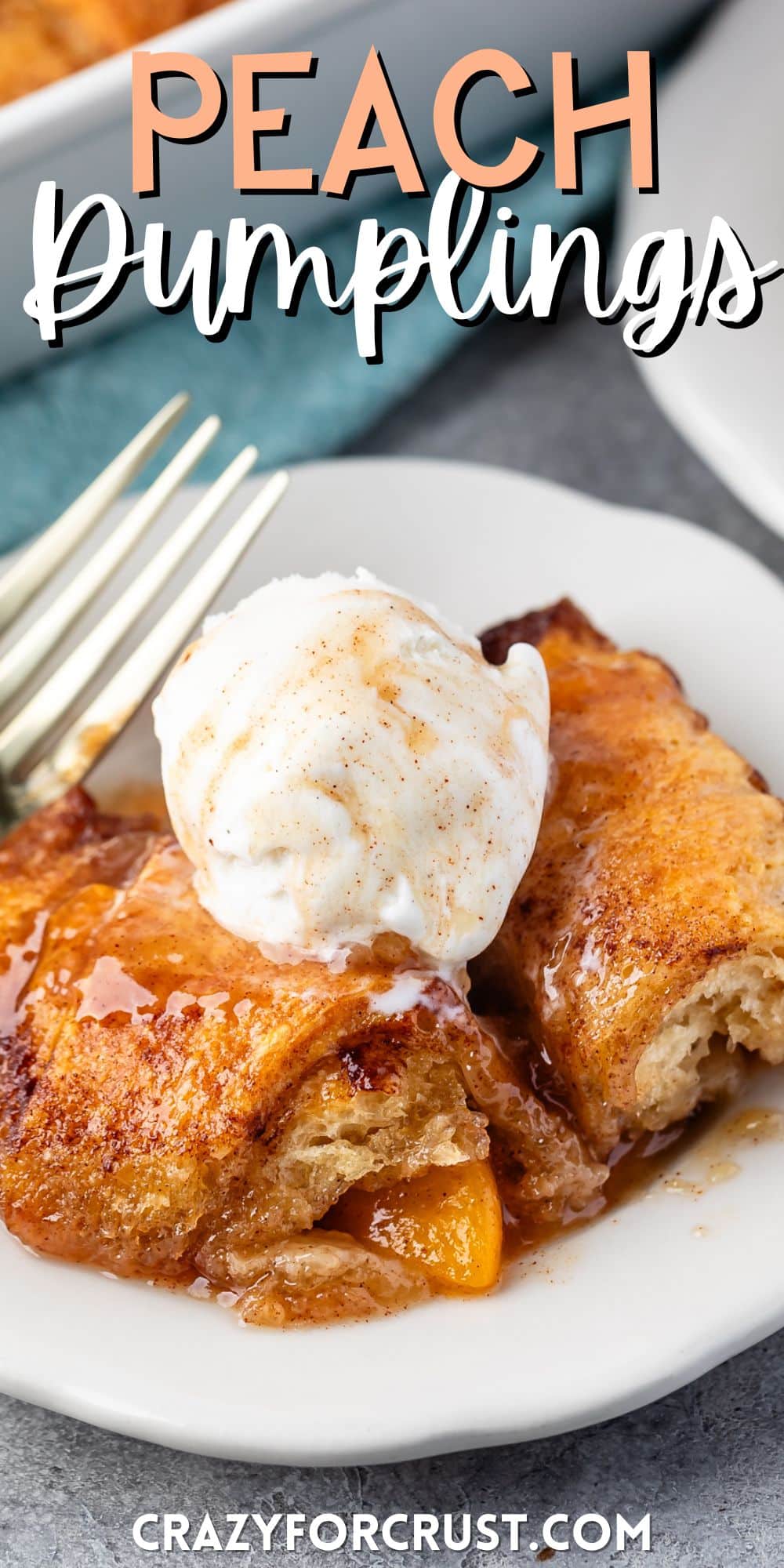 two crescent roll dumplings on a white plate next to a fork with ice cream on top and words on the image.