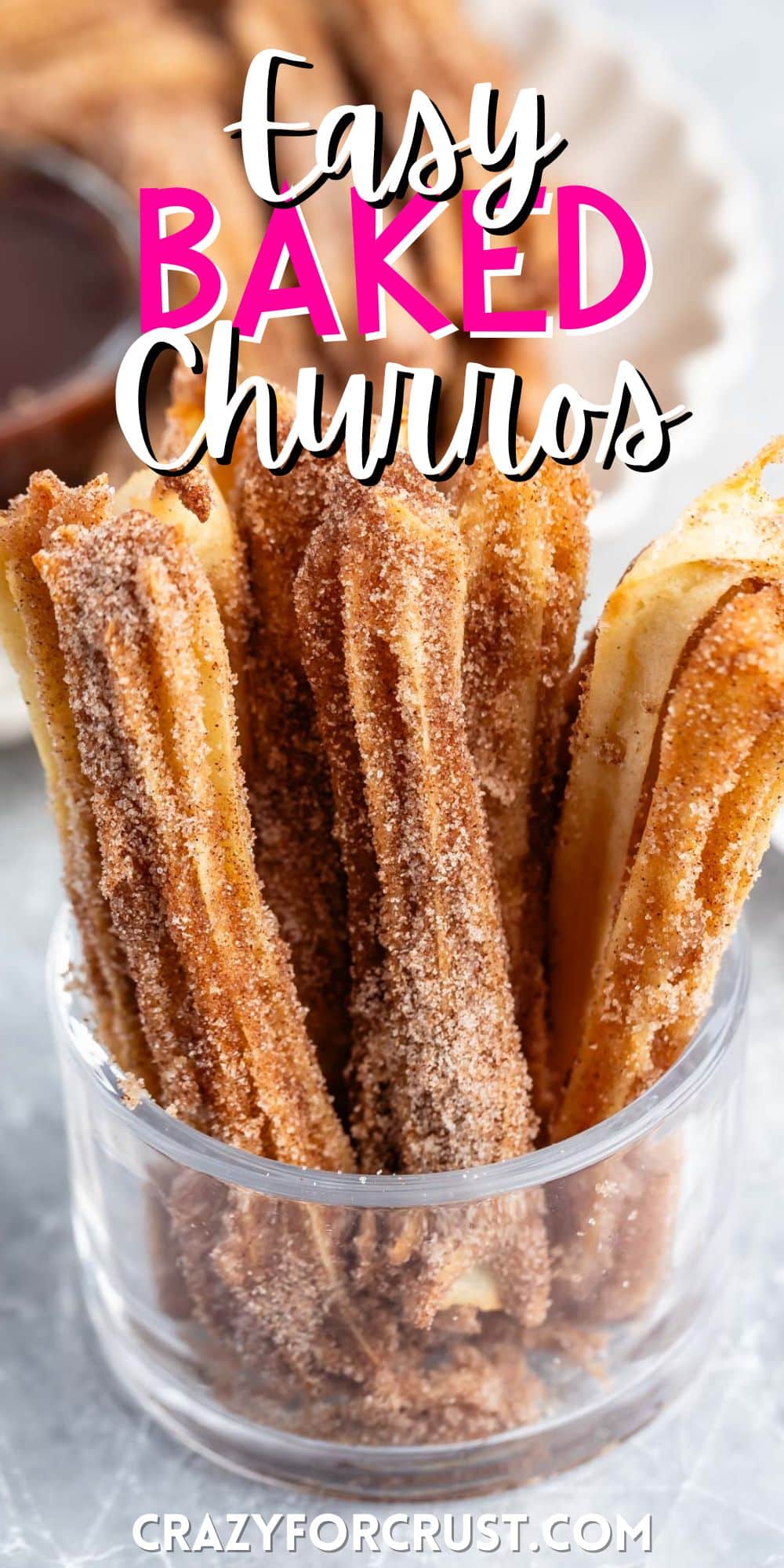 churros propped up together in a clear glass with words on the image.