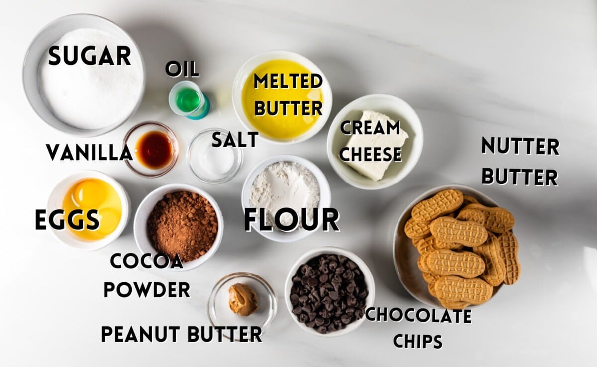 ingredients in buckeye brownies laid out on a marble counter.