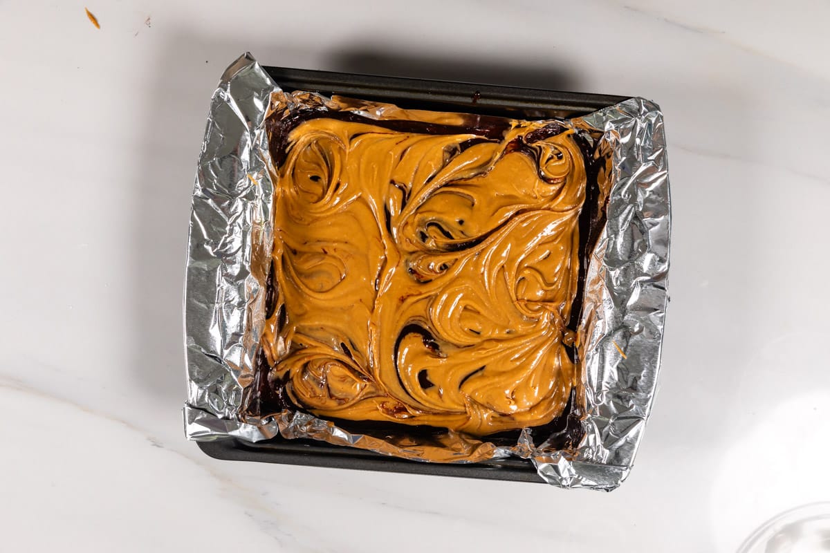 process shot of peanut butter brownies being made.