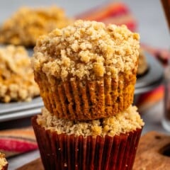 stacked muffins with streusel crumble topping.