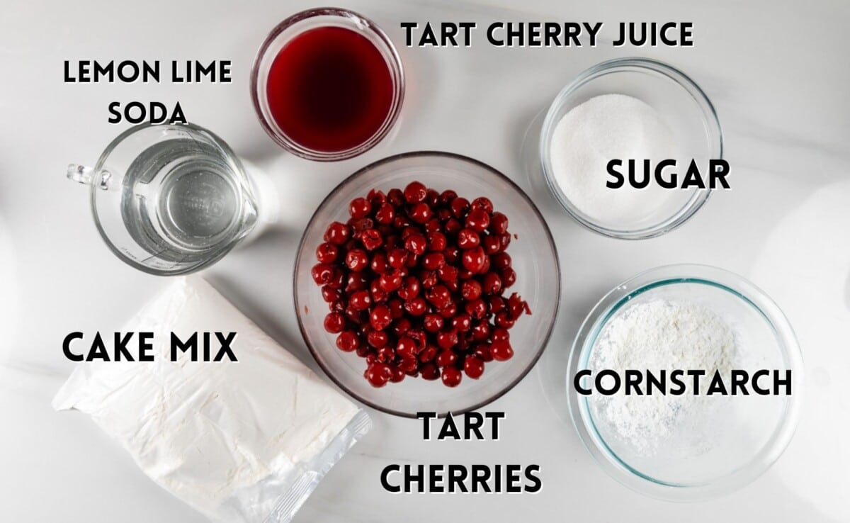 ingredients in tart cherry cobbler laid out on a white marble counter.