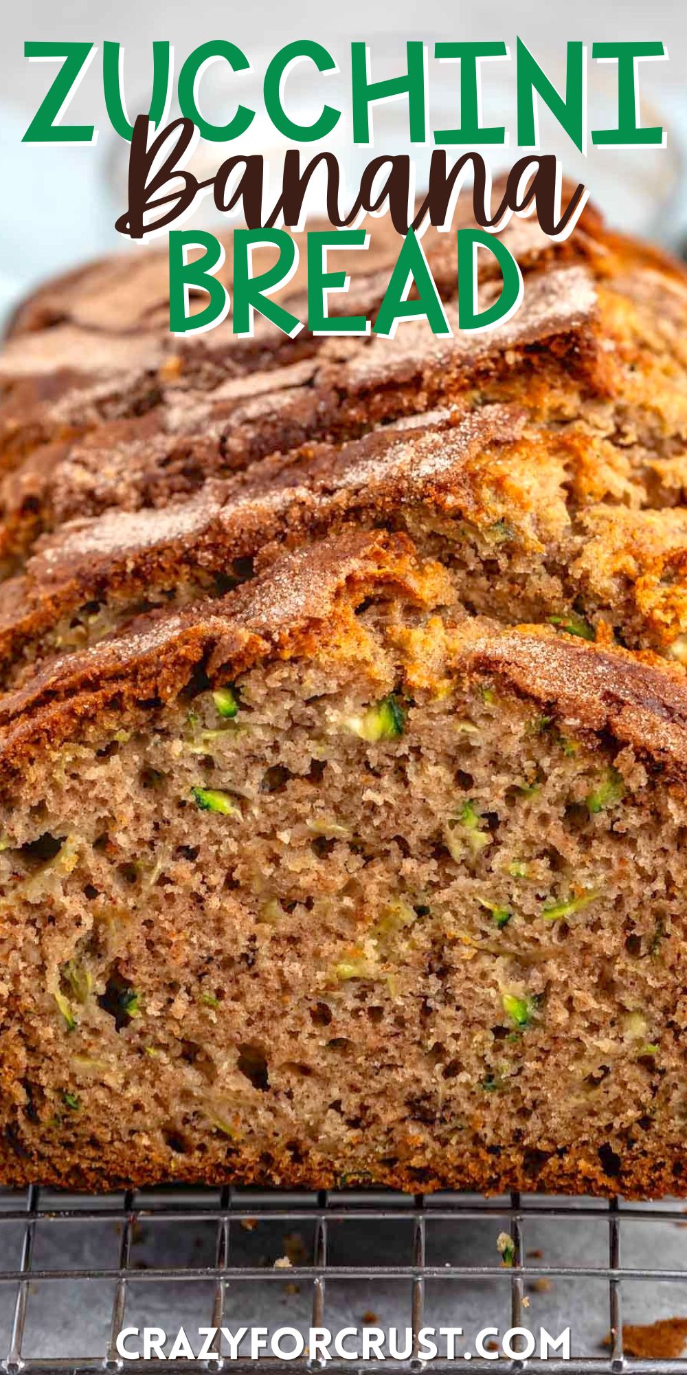 sliced banana bread with shredded zucchini baked inside with words on the image.