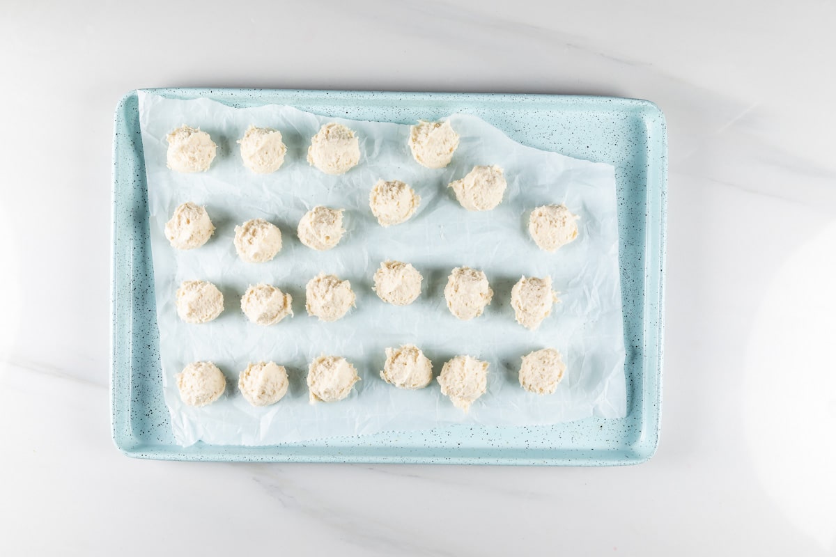 process shot of donut holes being made.