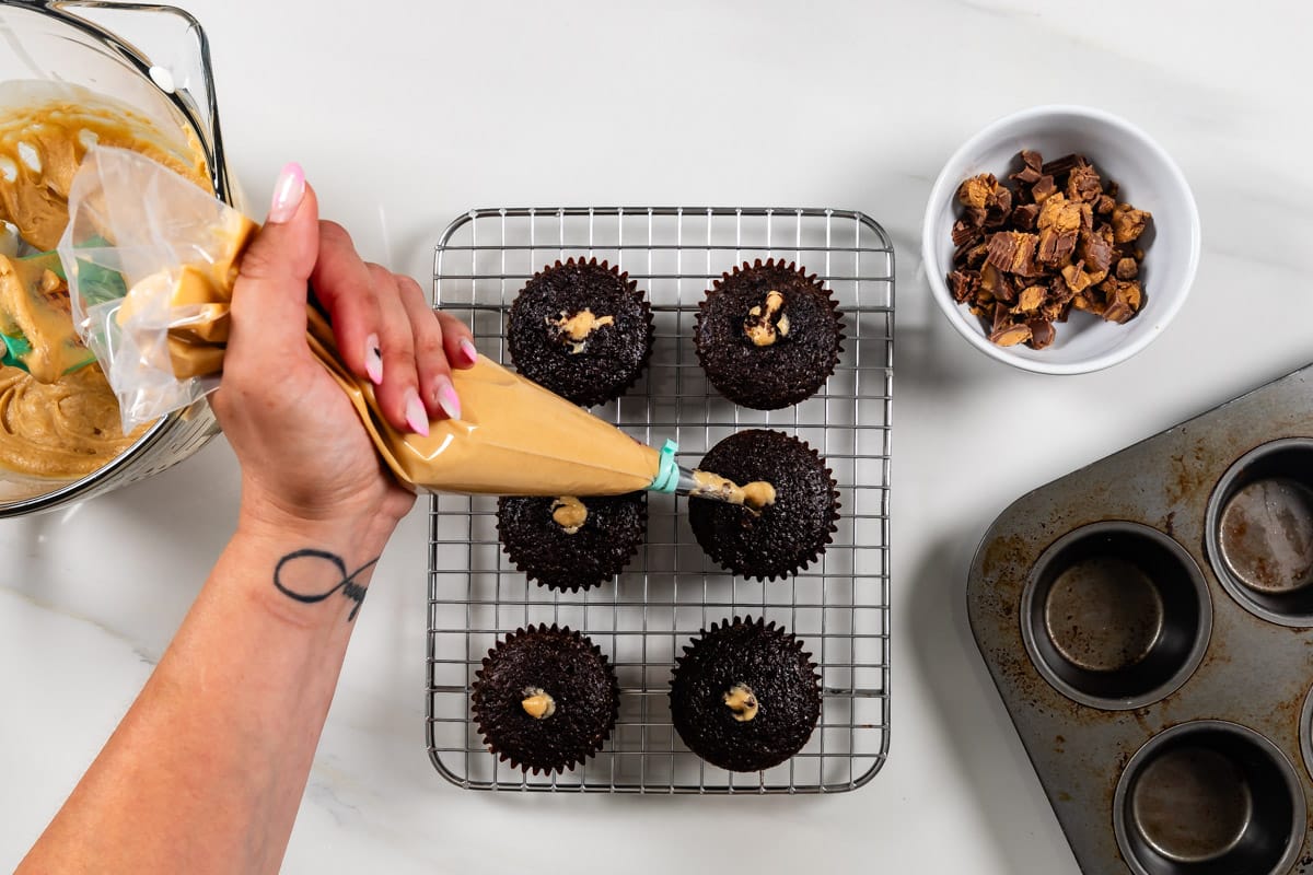 process shot of chocolate peanut butter cupcakes being made.