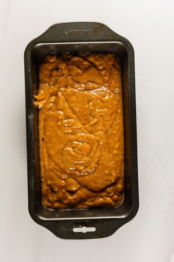 process shot of pumpkin banana bread being made.