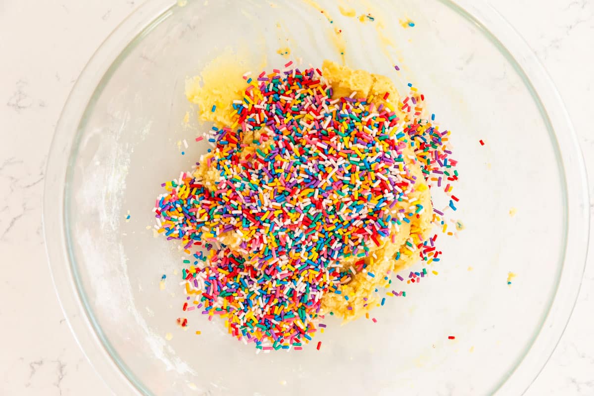 process shot of sprinkle cookies being made.