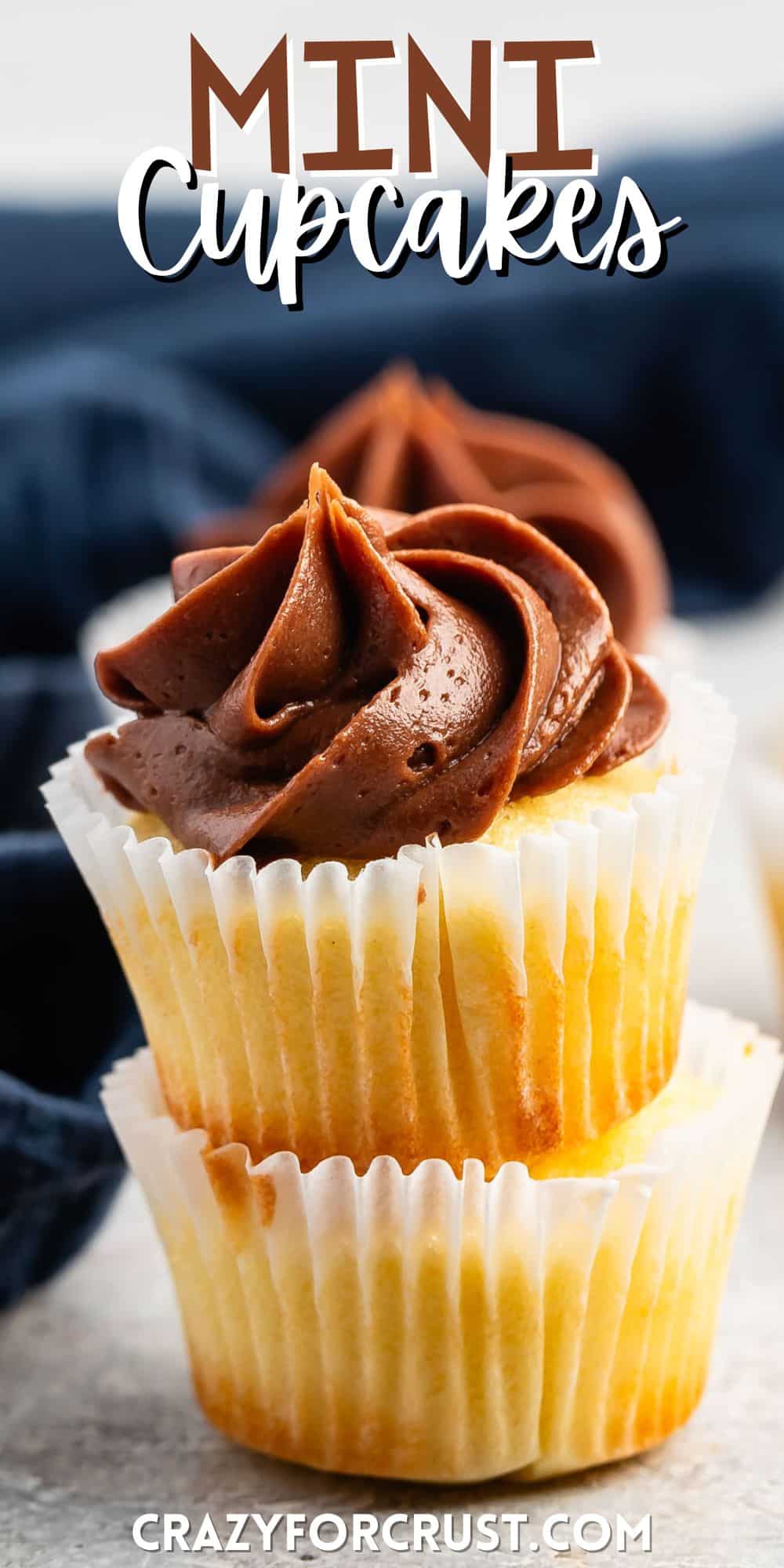 stacked mini vanilla cupcakes with chocolate frosting with words on the image.