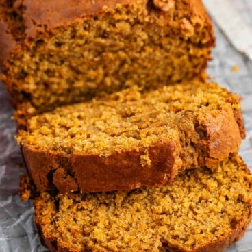 sliced banana bread on a drying rack.