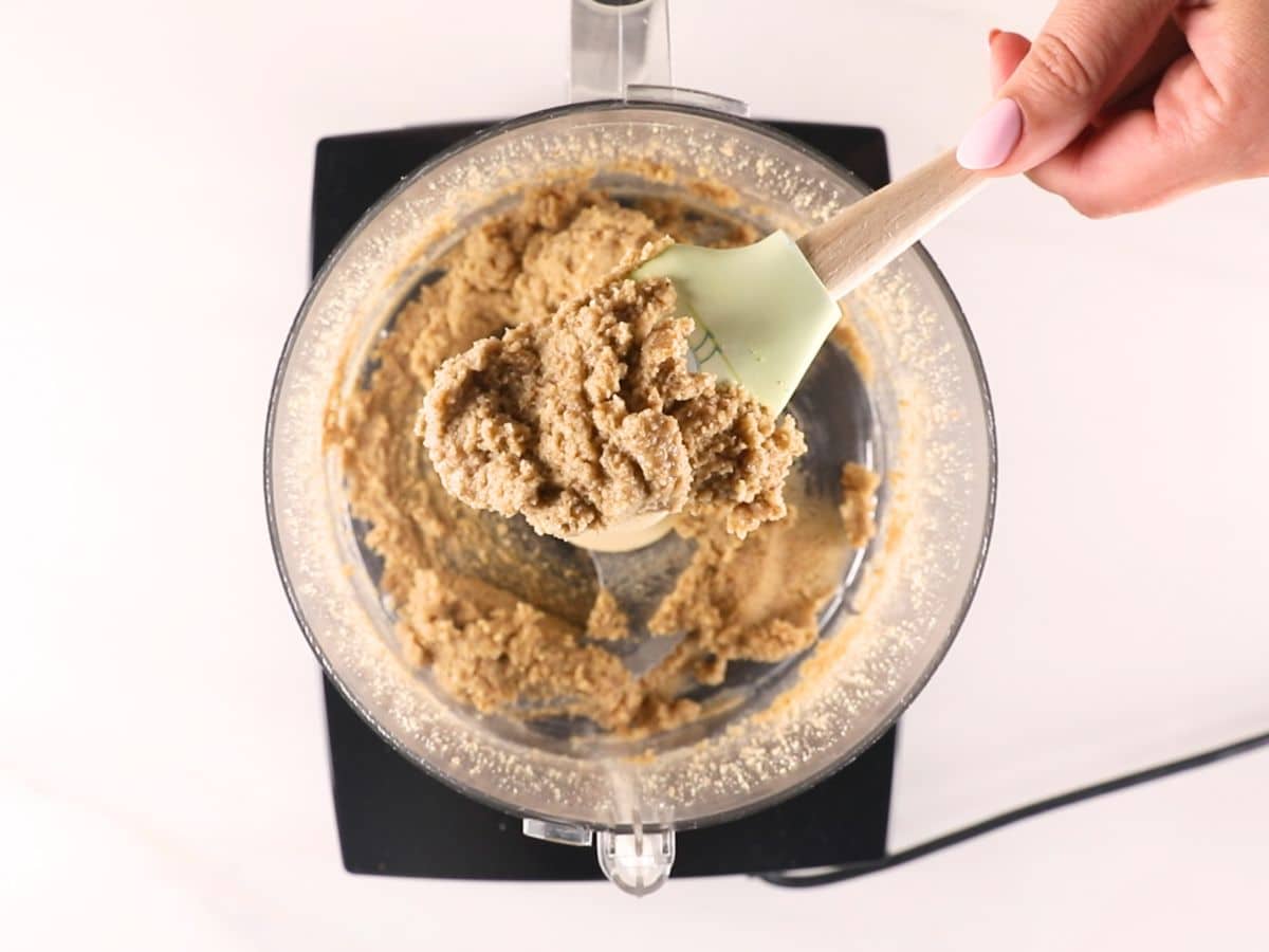 process shot of walnut butter being made.