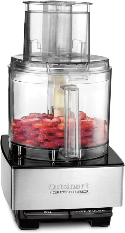 food processor with strawberries inside.