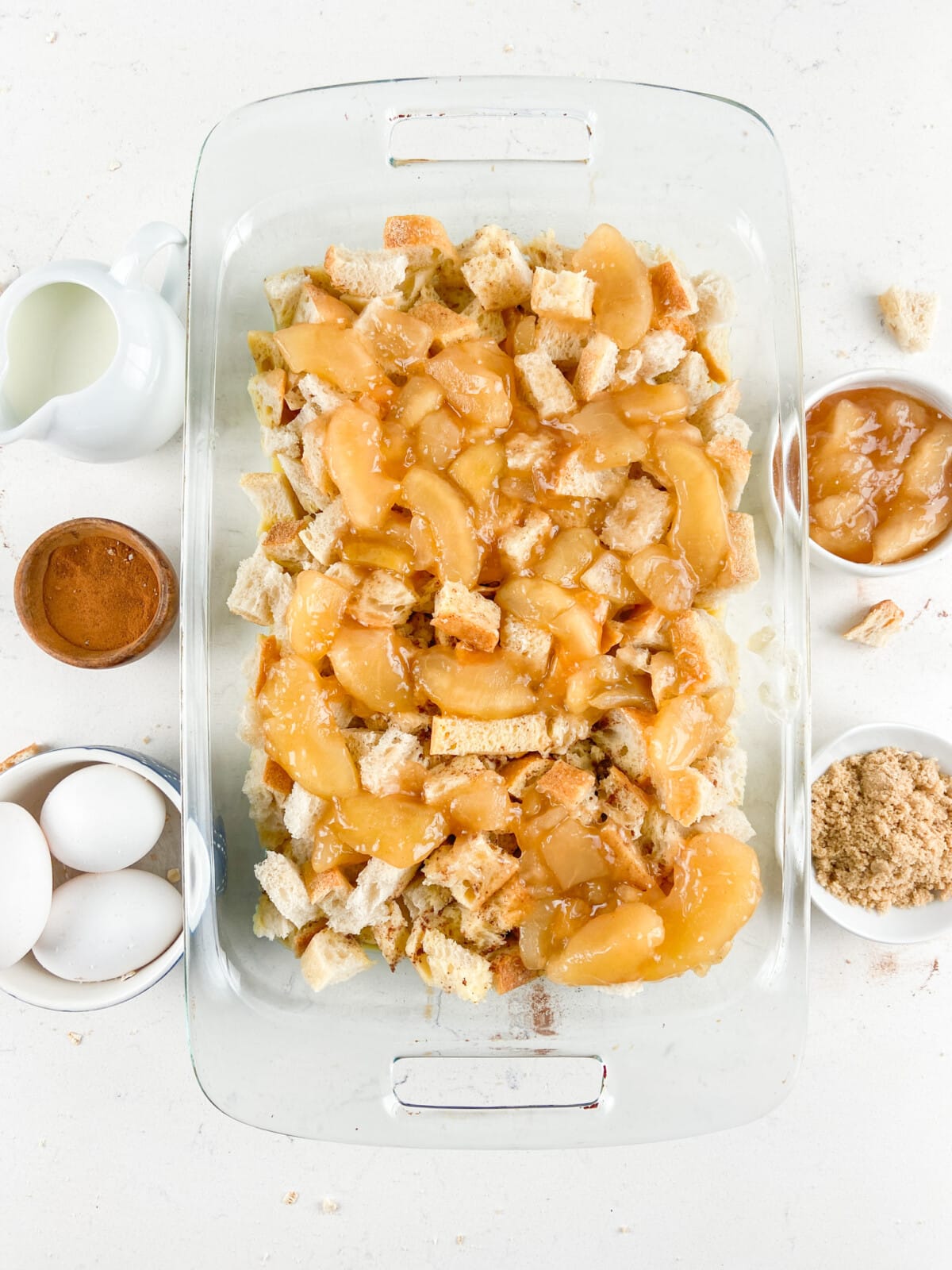 process shot of apple pie French toast casserole being made.