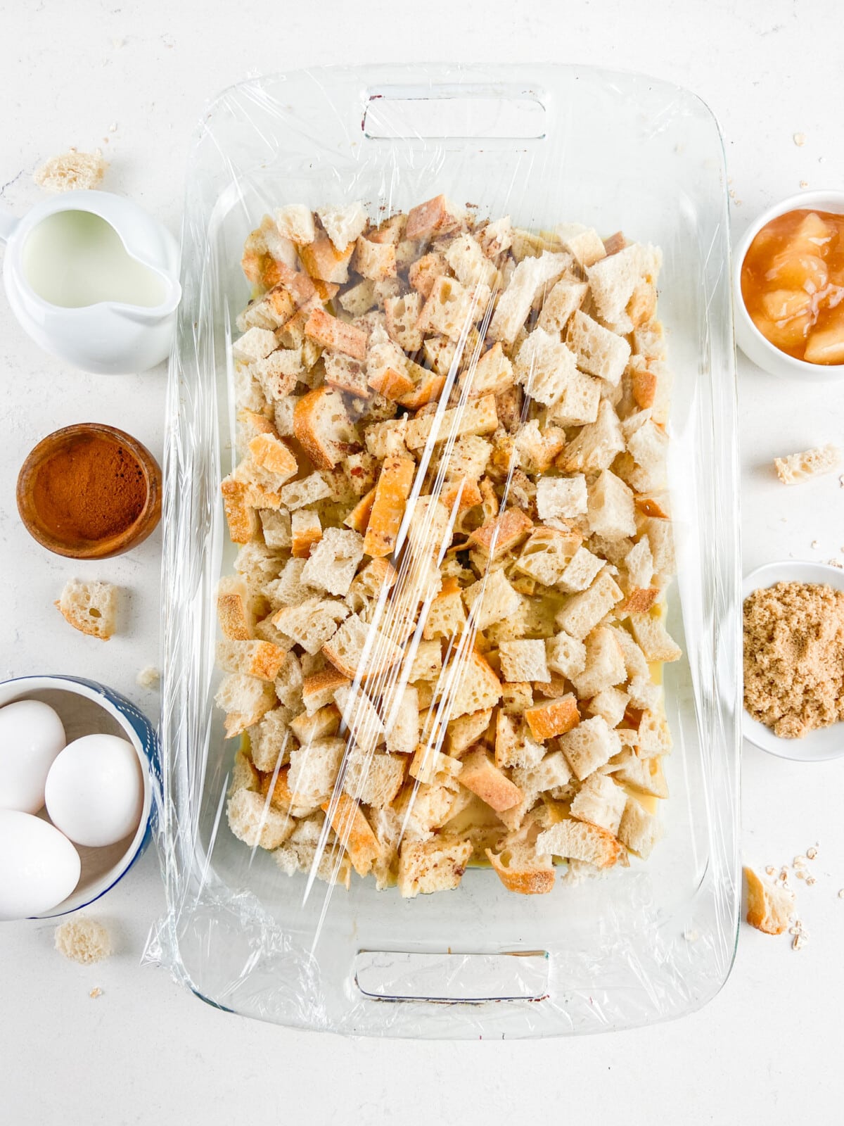 process shot of apple pie French toast casserole being made.