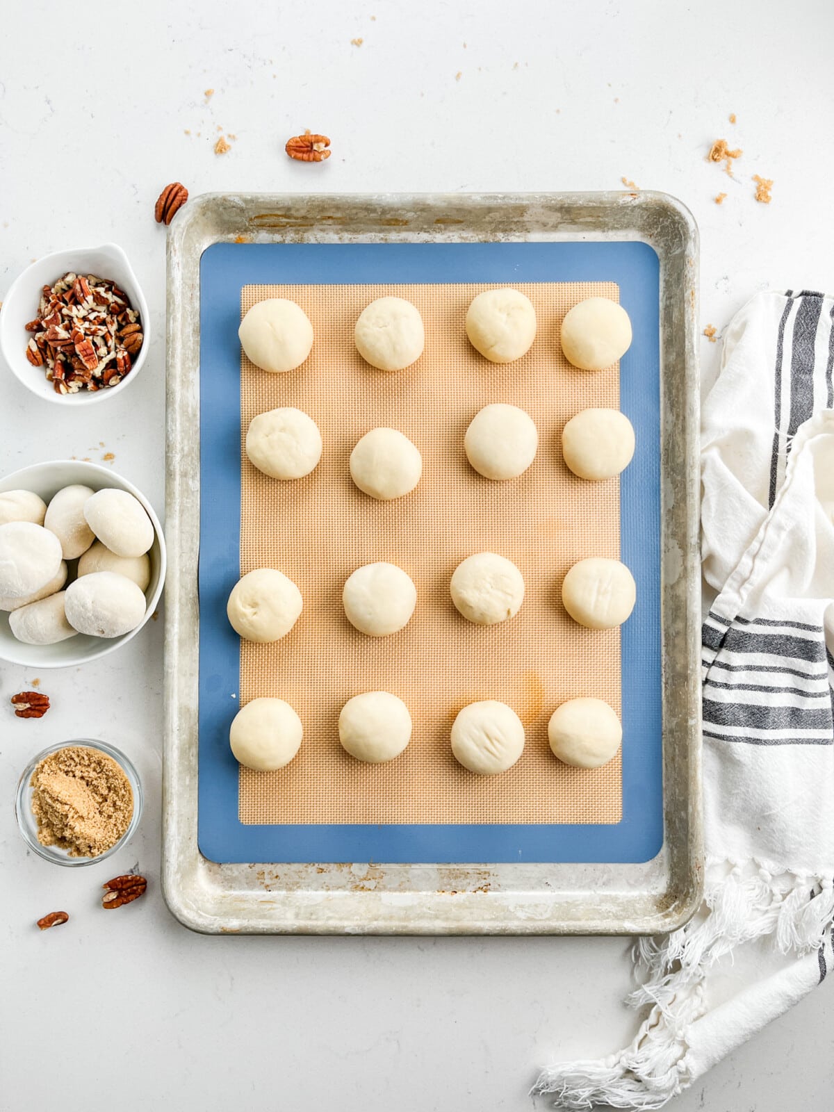 process shot of caramel monkey bread being made.