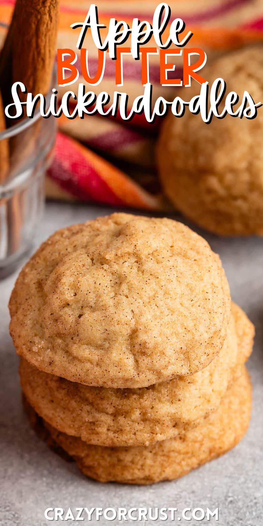 stacked snickerdoodles on a grey surface with words on the image.