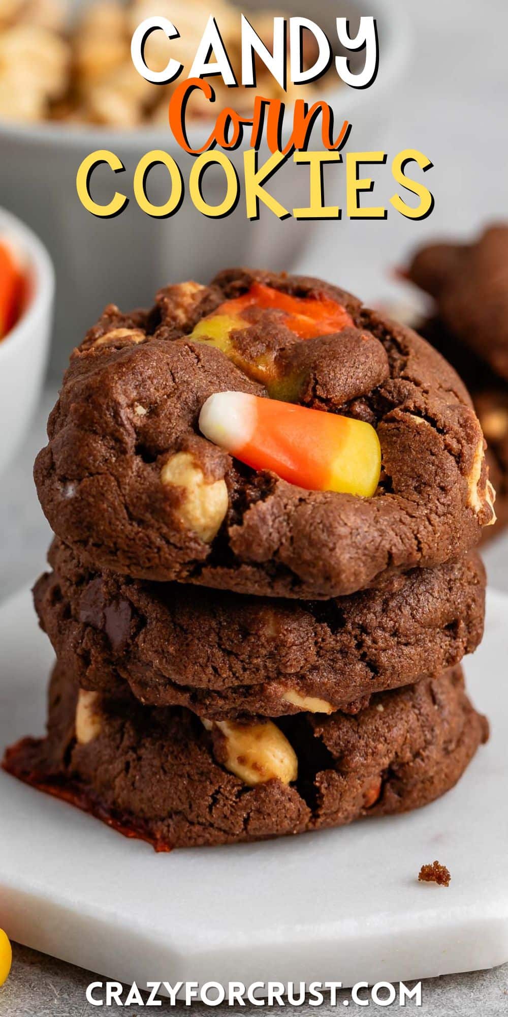 stacked cookies with candy corn baked in with words on the image.