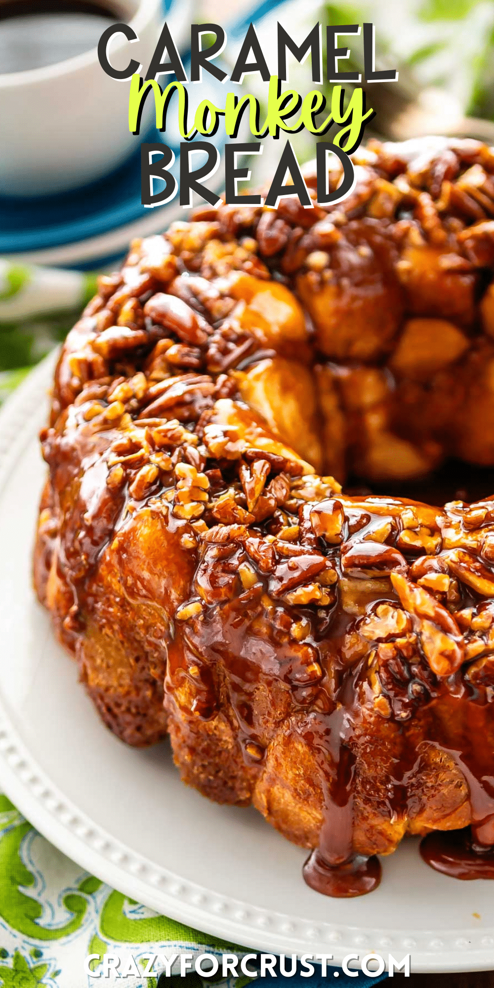 monkey bread on a white plate covered in nuts with words on the image.