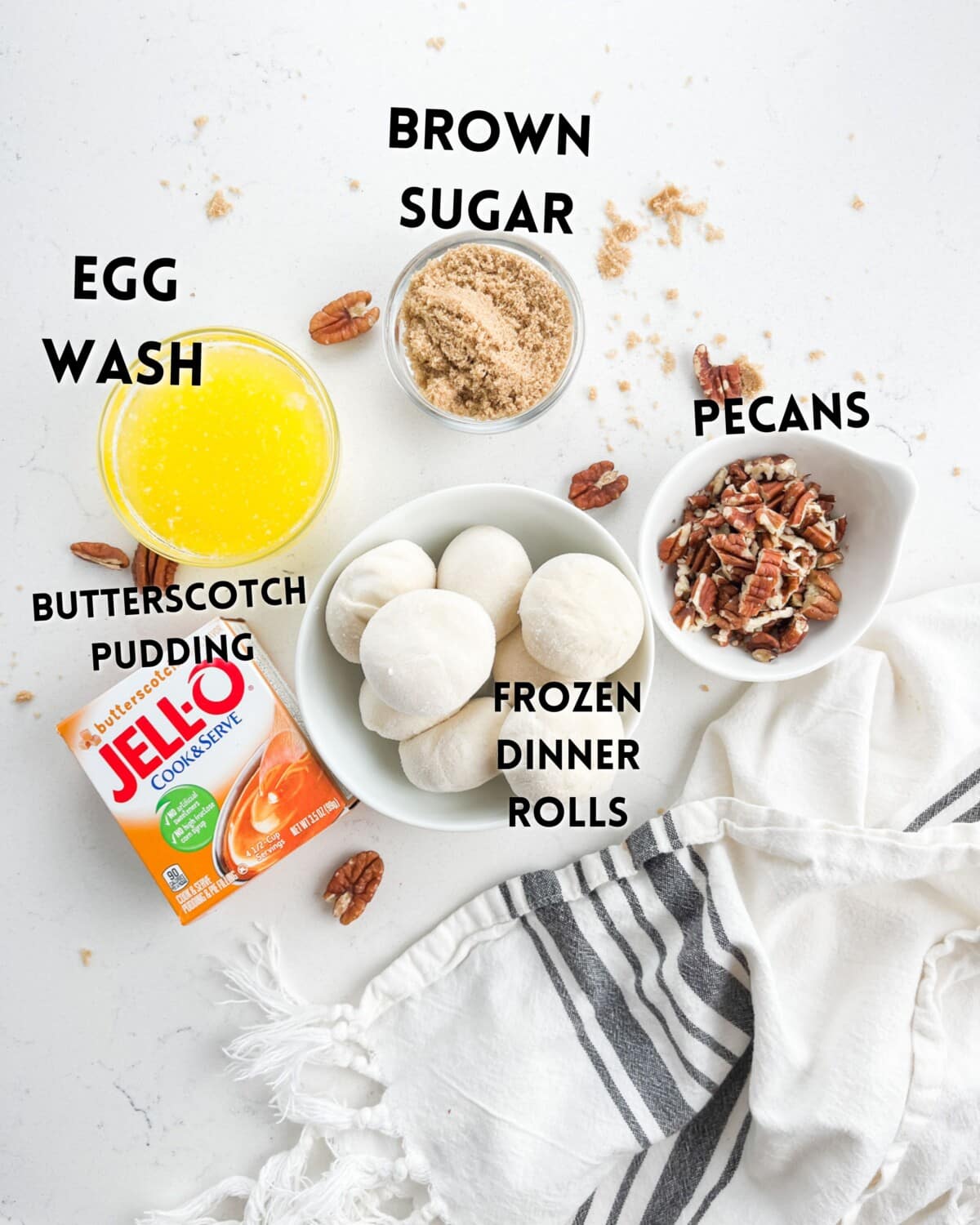 ingredients in caramel monkey bread on a white marble counter.