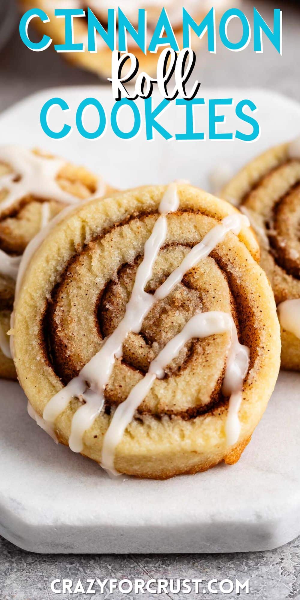 stacked cinnamon roll cookies with a glaze on top with words on the image.