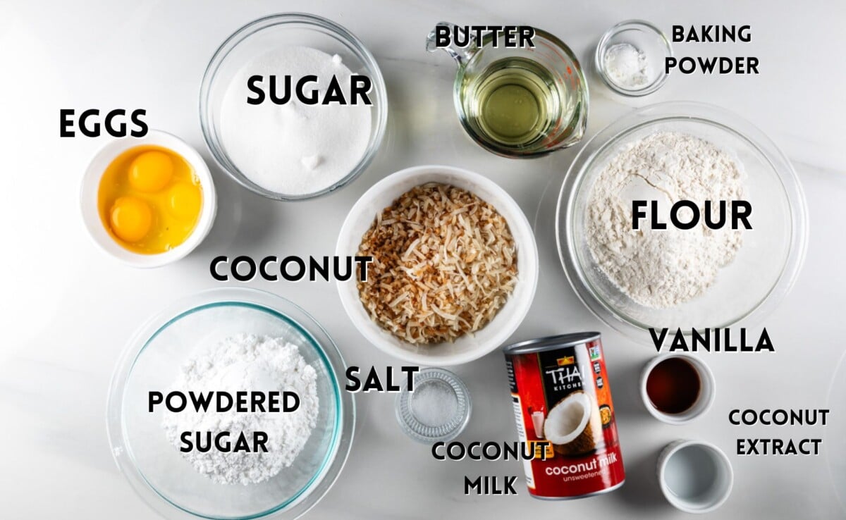 ingredients in coconut pound cake laid out on a white counter.