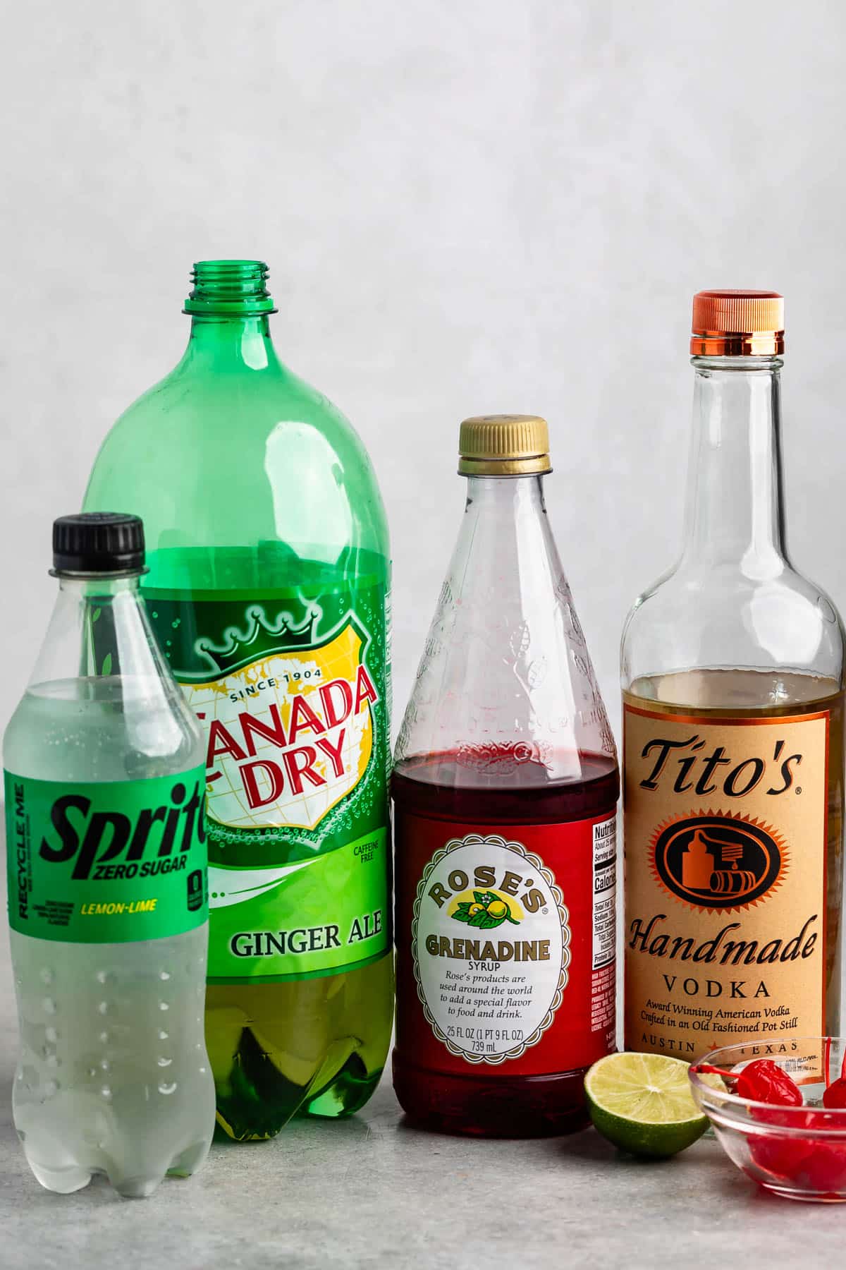 ingredients in dirty shirley laid out on a grey counter.