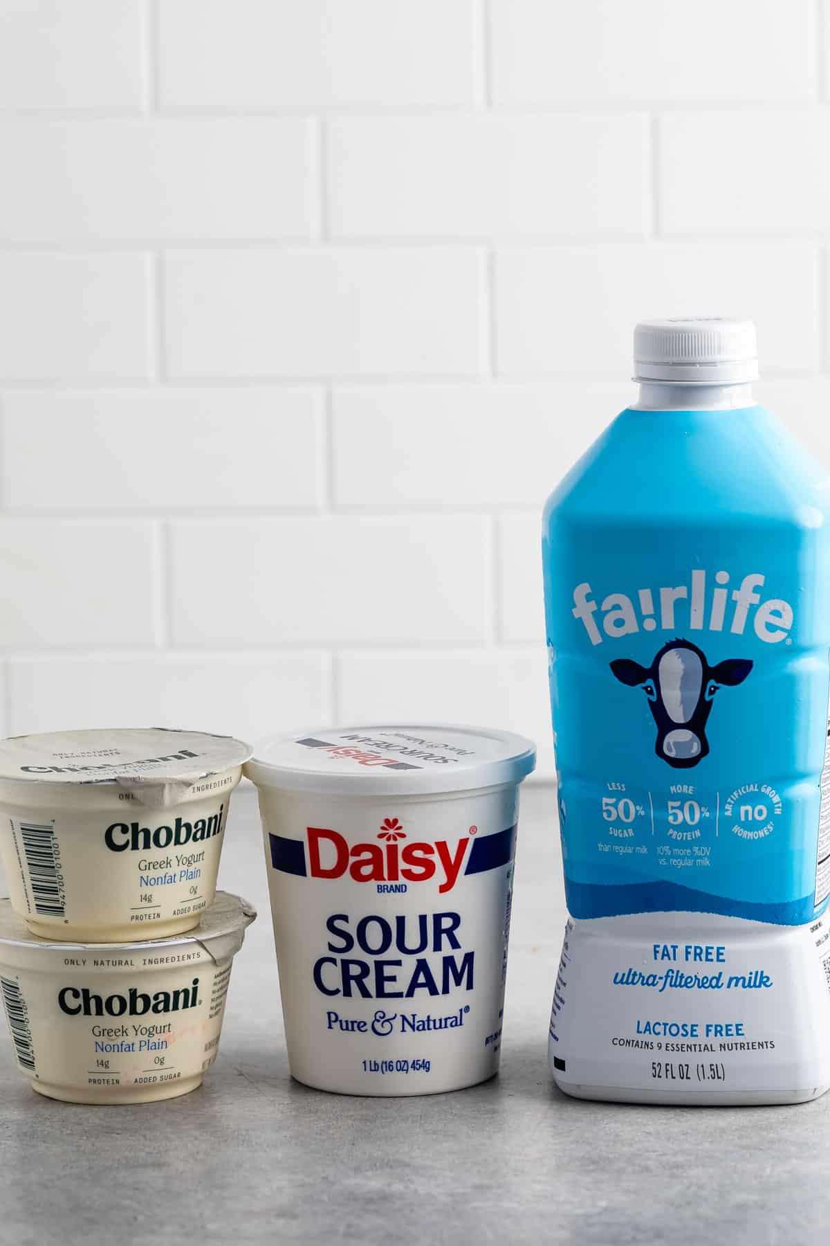 ingredients in buttermilk sitting on a grey counter.