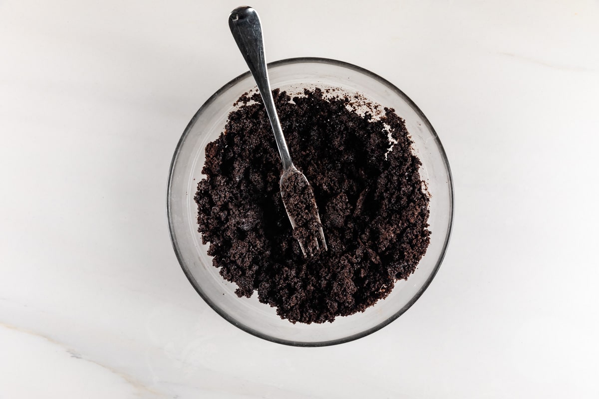 process shot of Oreo cookie crust being made.