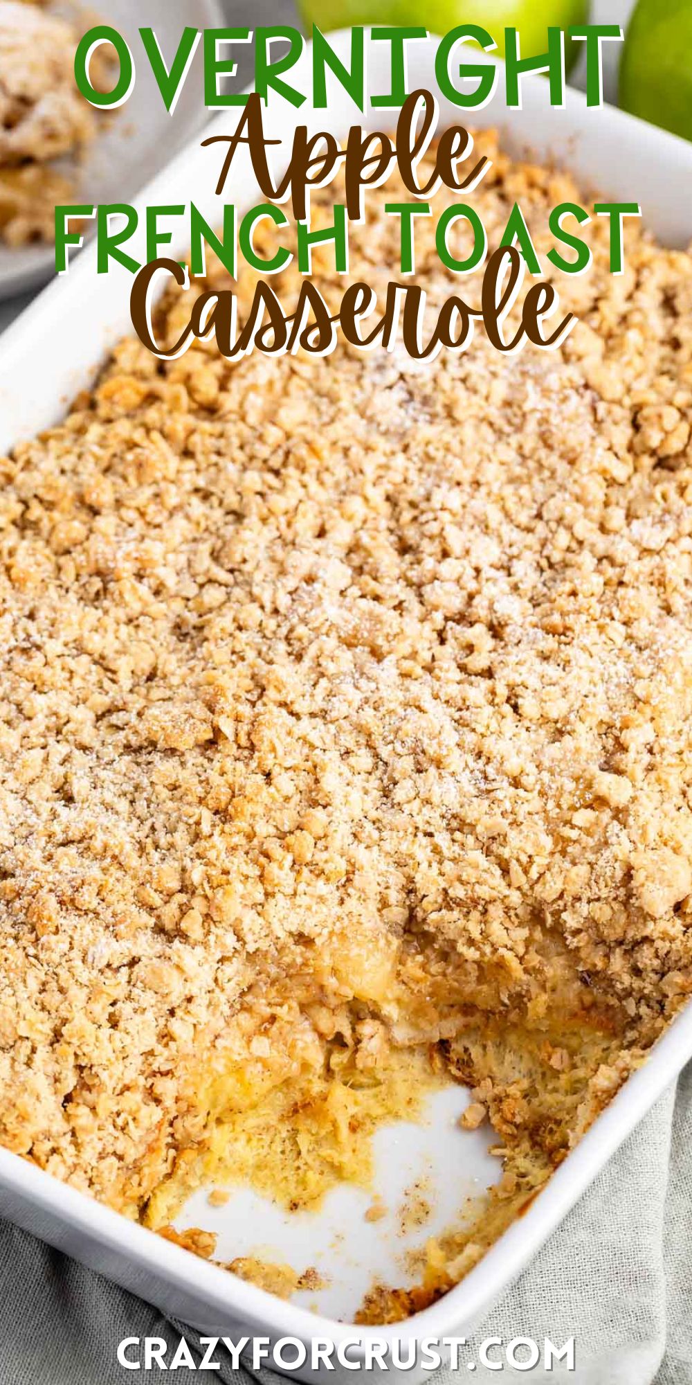 apple pie casserole in a white pan with a crumble on top with words on the image.